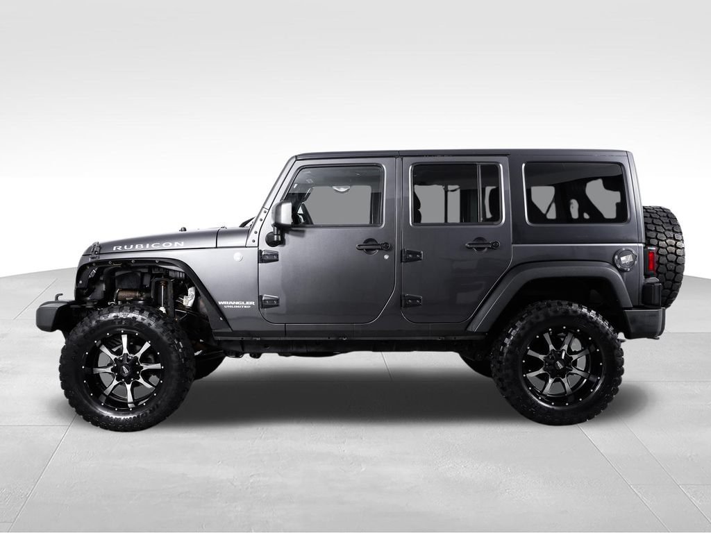 Used 2014 Jeep Wrangler Unlimited Rubicon w/ Dual Top Group AWD/4WD image 5