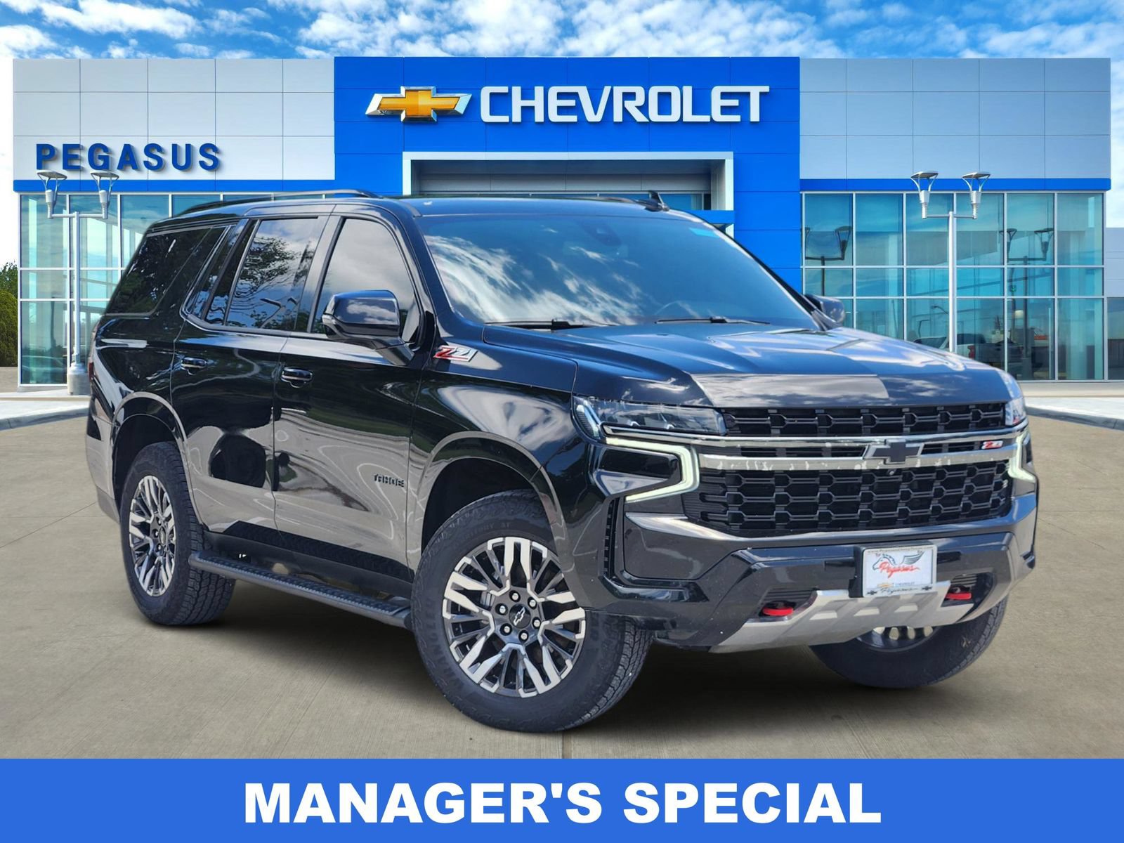 Certified 2021 Chevrolet Tahoe Z71 w/ Luxury Package AWD/4WD image 1