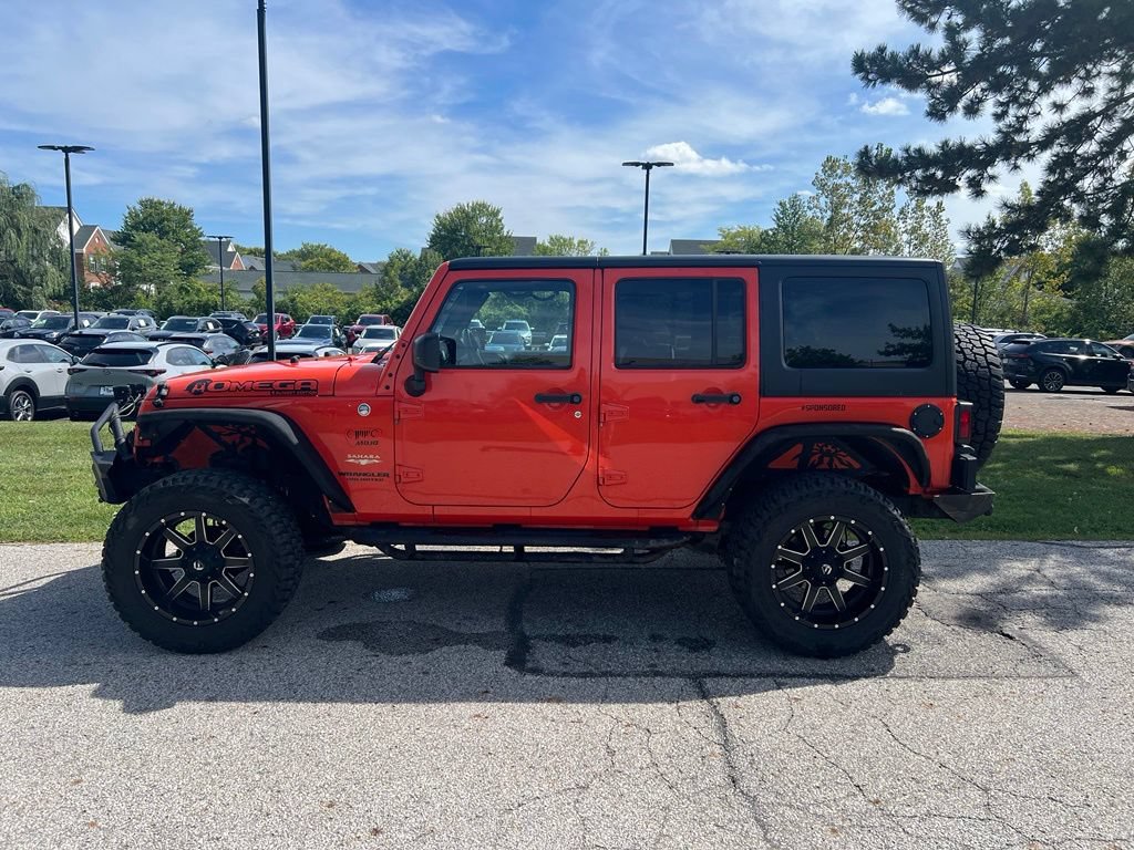 Used 2015 Jeep Wrangler Unlimited Sahara w/ Dual Top Group AWD/4WD image 2