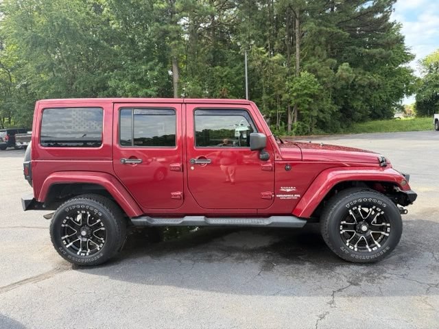 Used 2012 Jeep Wrangler Unlimited Sahara w/ Dual Top Group AWD/4WD image 4