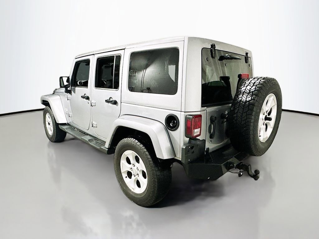 Used 2014 Jeep Wrangler Unlimited Sahara w/ Dual Top Group AWD/4WD image 6