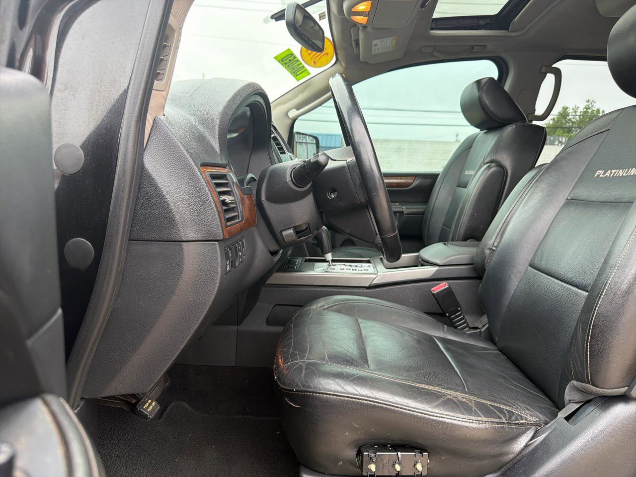 Used 2011 Nissan Armada Platinum w/ 2nd Row Captain Seat Pkg AWD/4WD image 11