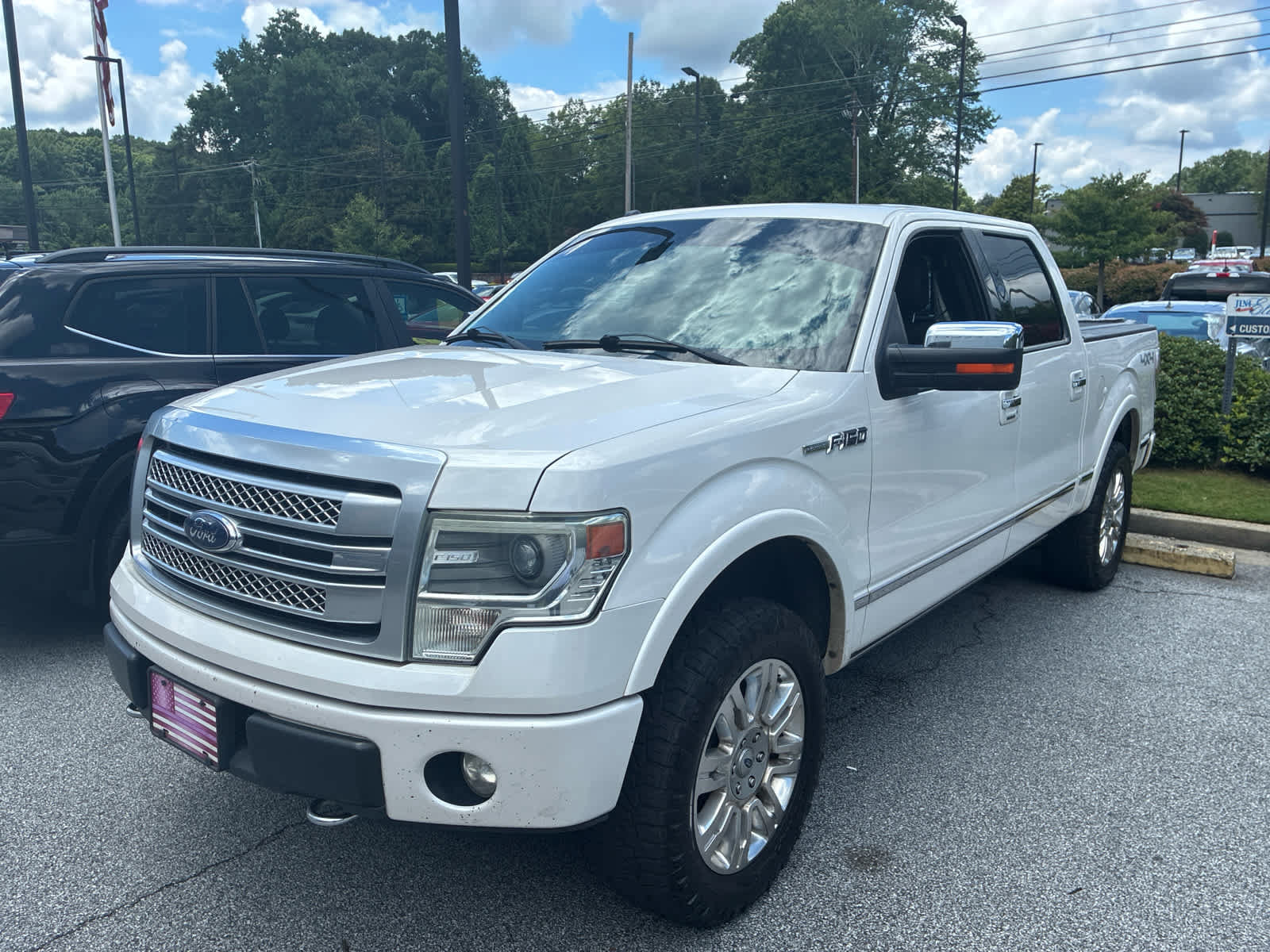 Used 2014 Ford F150 Platinum AWD/4WD image 1