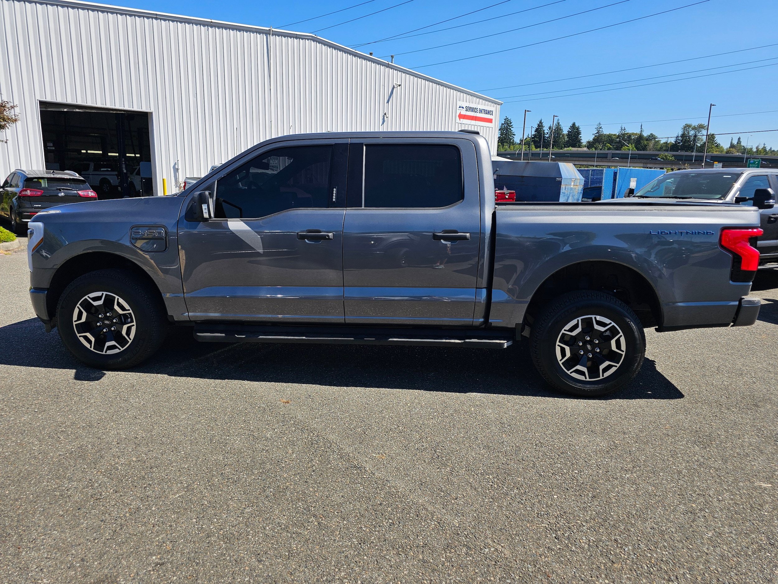Certified 2023 Ford F150 Lightning XLT w/ Tow Technology Package AWD/4WD image 8