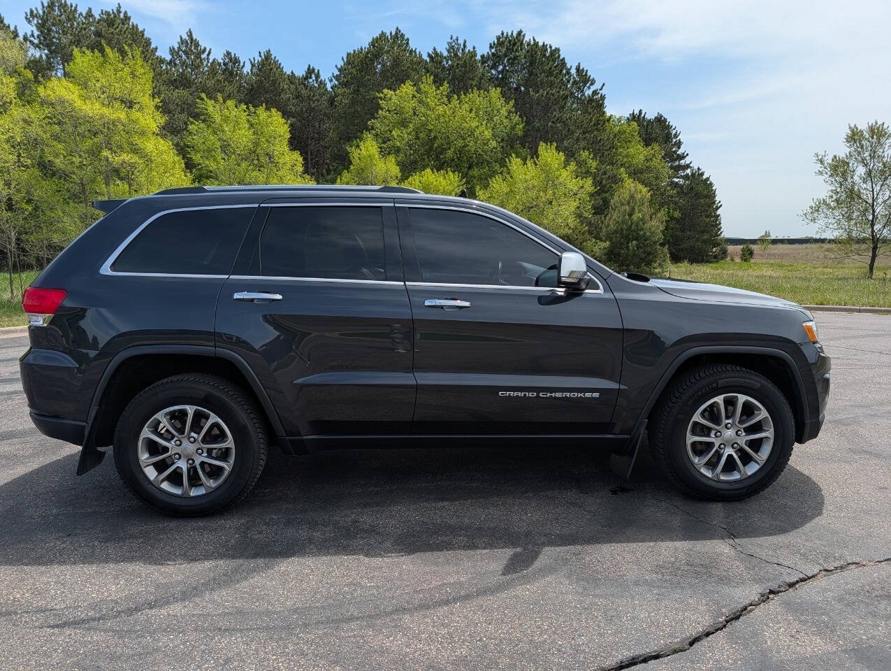 Used 2015 Jeep Grand Cherokee Limited w/ Luxury Group II AWD/4WD image 1