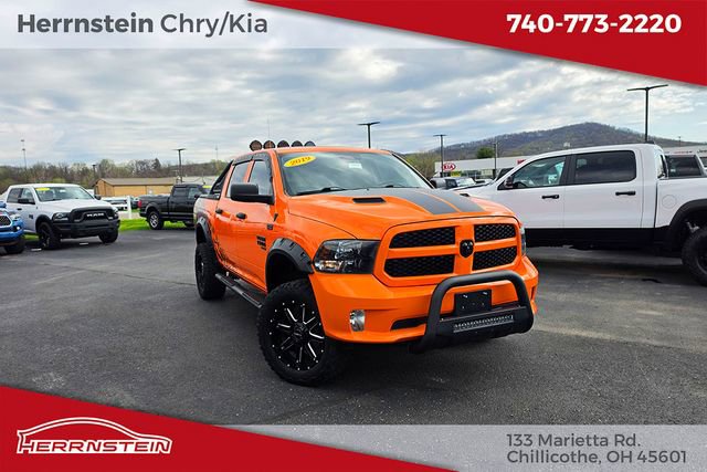 Used 2019 RAM 1500 Express w/ Ignition Orange Sport Package AWD/4WD image 1