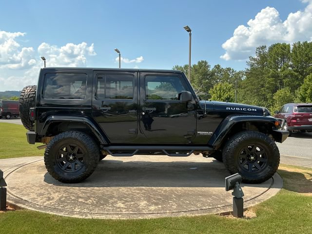 Used 2012 Jeep Wrangler Unlimited Rubicon w/ Dual Top Group AWD/4WD image 8