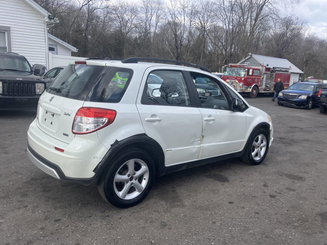 Used 2009 Suzuki SX4 Base AWD Crossover 4dr 4A image 7