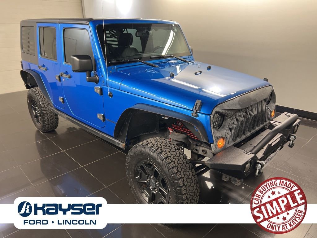 Used 2016 Jeep Wrangler Unlimited Sahara image 1