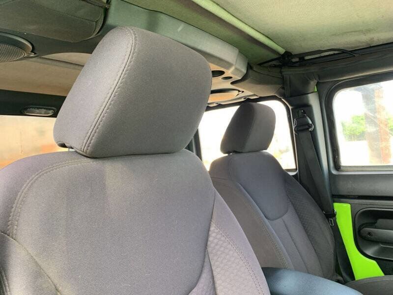 Used 2013 Jeep Wrangler Unlimited Sport w/ Mopar Black Appearance Group image 12