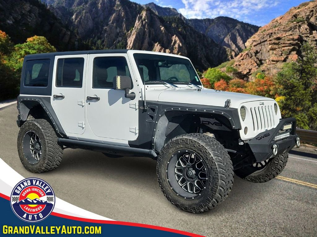 Used 2016 Jeep Wrangler Unlimited Sahara w/ Max Tow Package AWD/4WD image 1