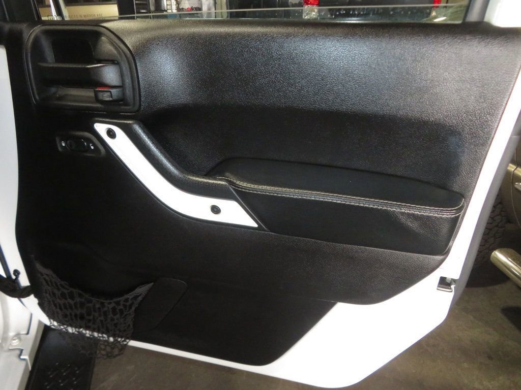Used 2014 Jeep Wrangler Unlimited Sahara AWD/4WD image 30