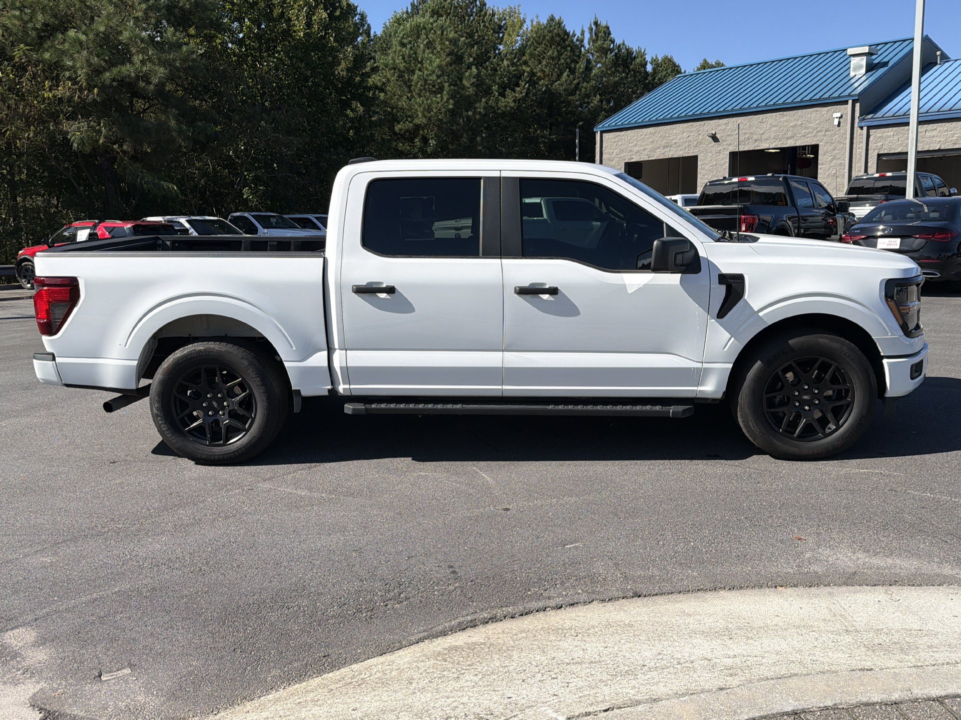 Used 2024 Ford F150 STX w/ STX Black Appearance Package RWD image 18