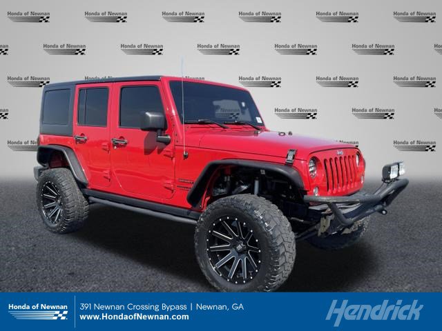 Used 2014 Jeep Wrangler Unlimited Sport image 1