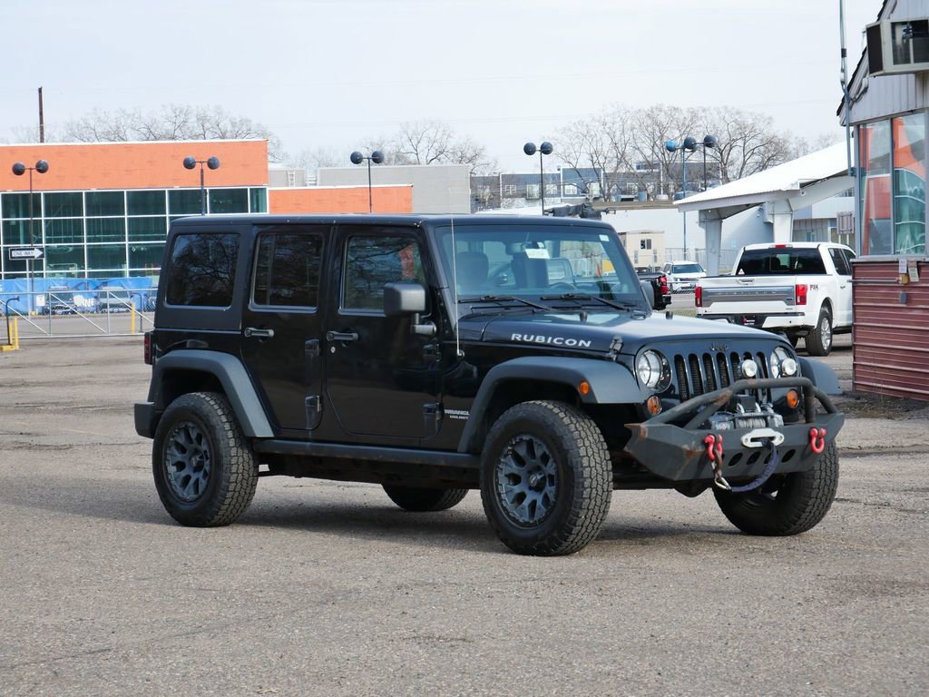 Used 2013 Jeep Wrangler Unlimited Rubicon w/ Dual Top Group image 1