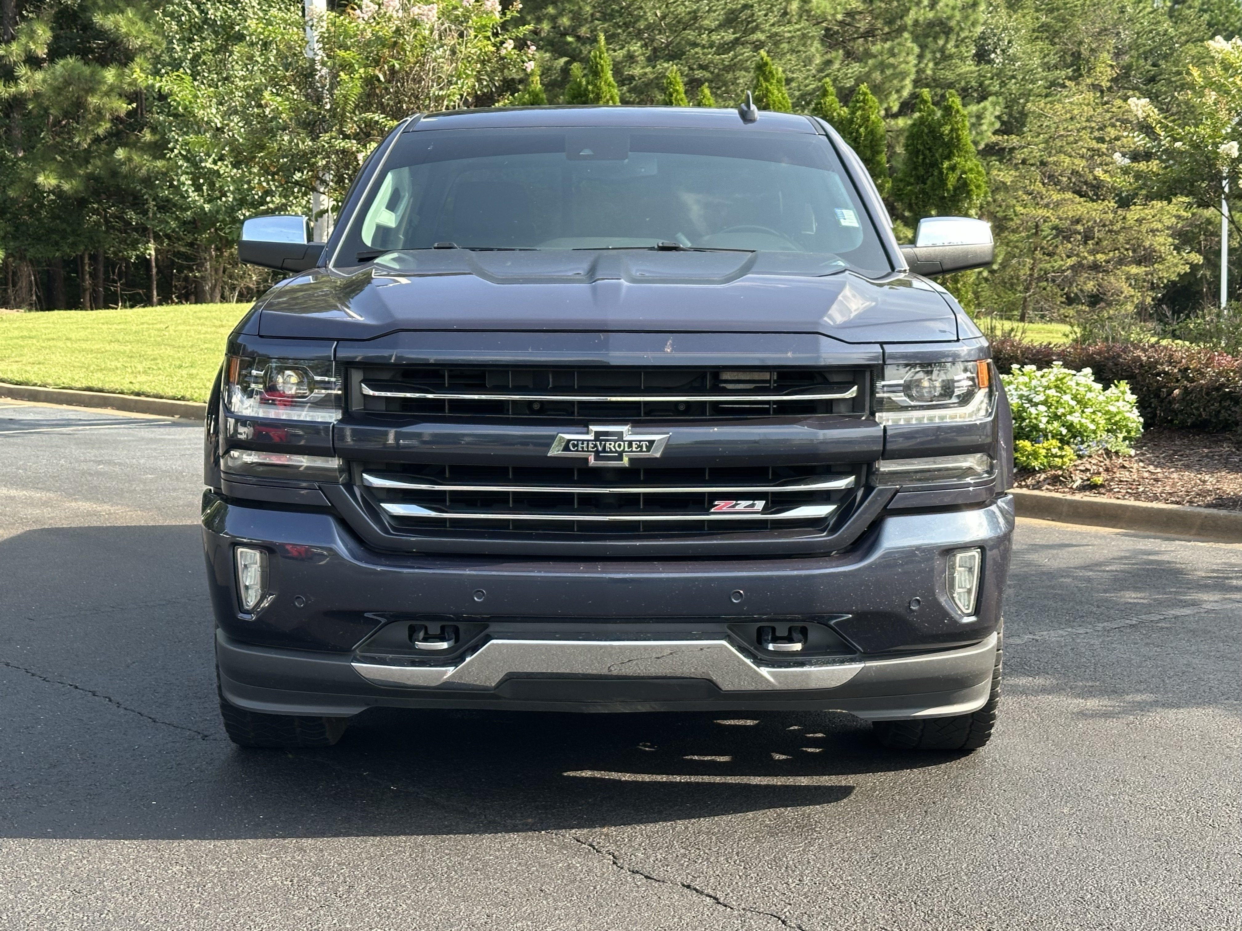 Used 2018 Chevrolet Silverado 1500 LTZ Z71 w/ Centennial Edition AWD/4WD image 3