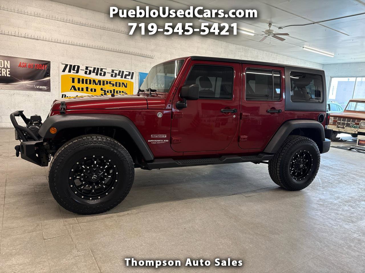 Used 2012 Jeep Wrangler Unlimited Sport image 1