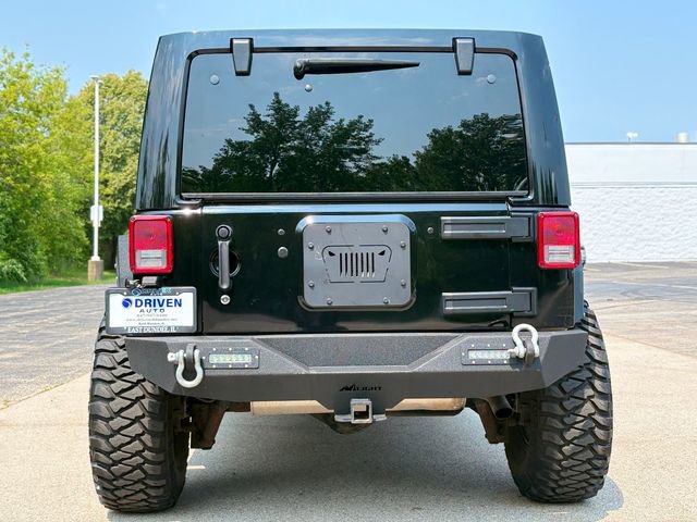 Used 2013 Jeep Wrangler Unlimited Sahara w/ Dual Top Group AWD/4WD image 6