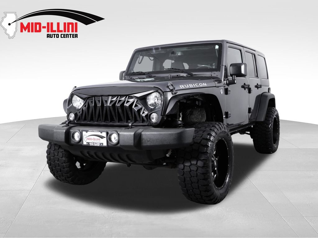 Used 2014 Jeep Wrangler Unlimited Rubicon w/ Dual Top Group AWD/4WD image 1