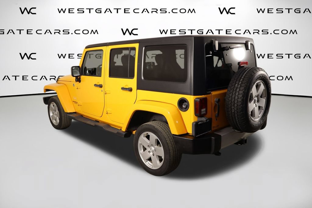 Used 2012 Jeep Wrangler Unlimited Sahara w/ Dual Top Group AWD/4WD image 33