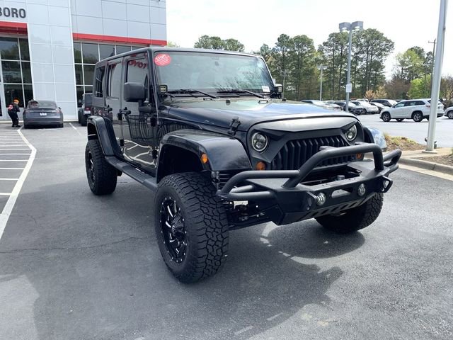 Used 2013 Jeep Wrangler Unlimited Sahara w/ Dual Top Group image 2