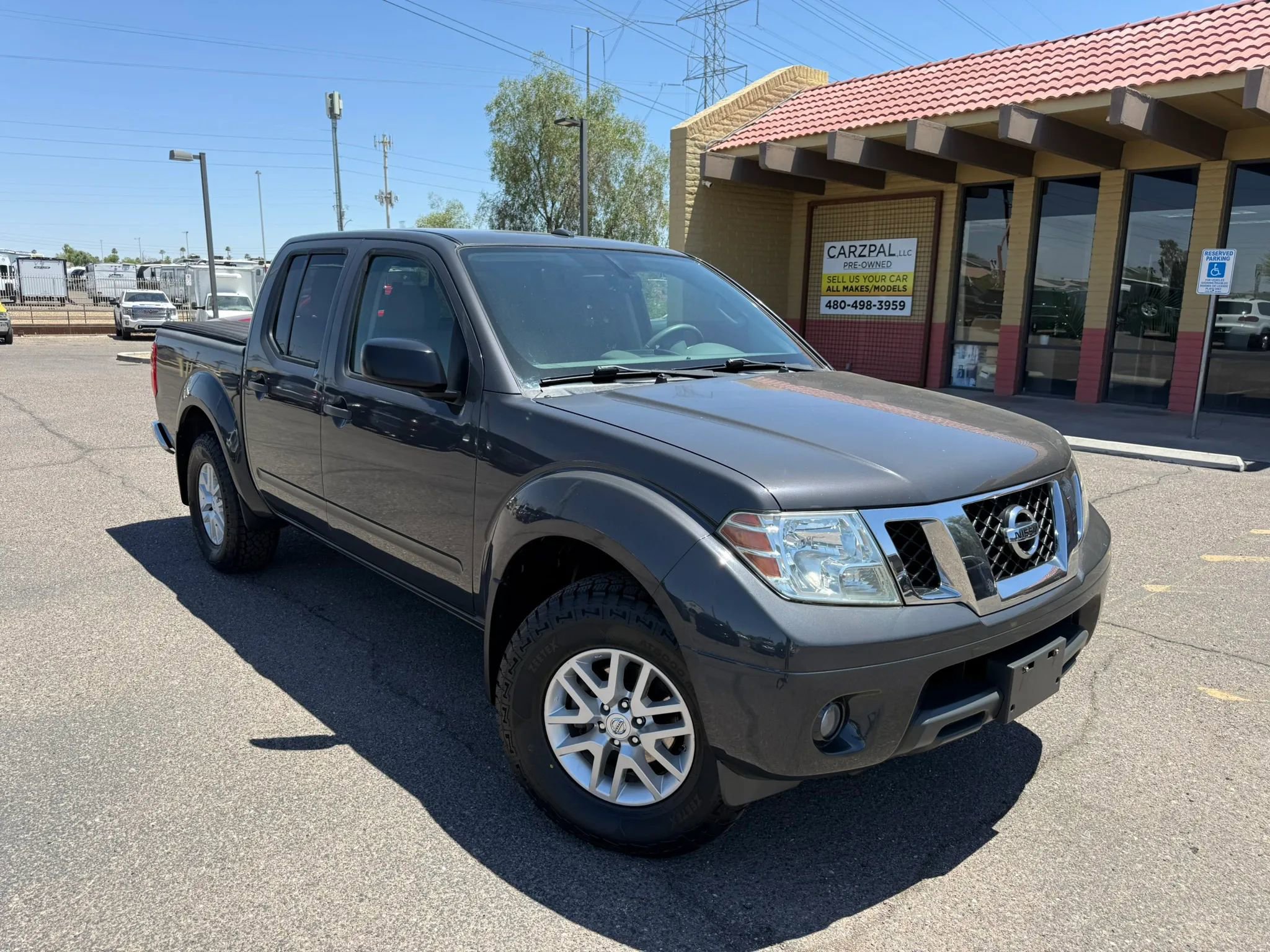Used 2015 Nissan Frontier SV w/ SV Value Truck Package AWD/4WD image 1