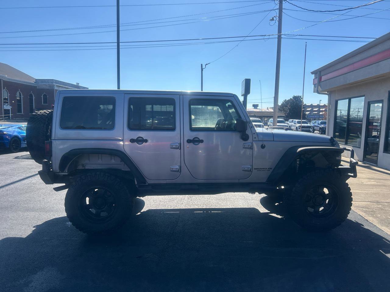 Used 2013 Jeep Wrangler Unlimited Sahara w/ Dual Top Group image 4