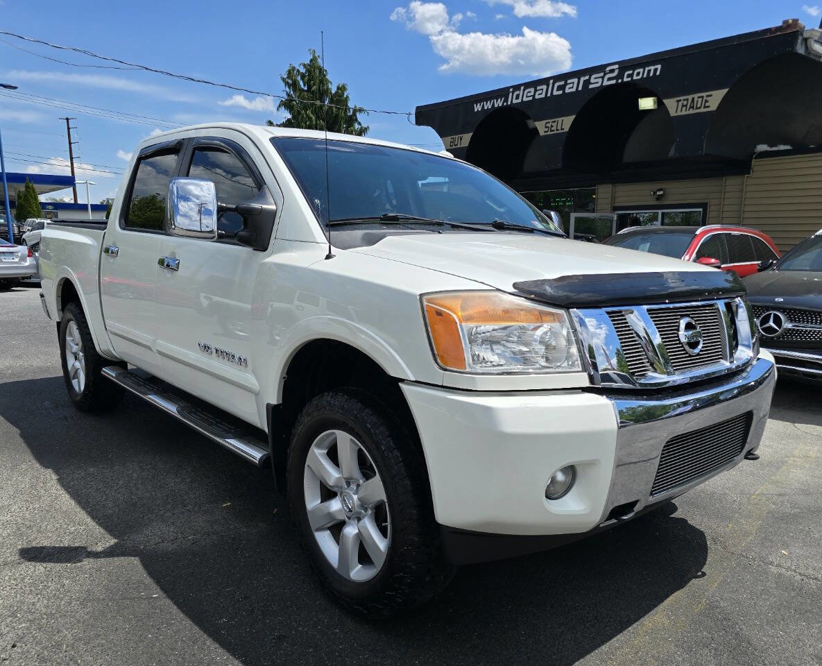 Used 2015 Nissan Titan SL w/ SL Moonroof Package AWD/4WD image 1