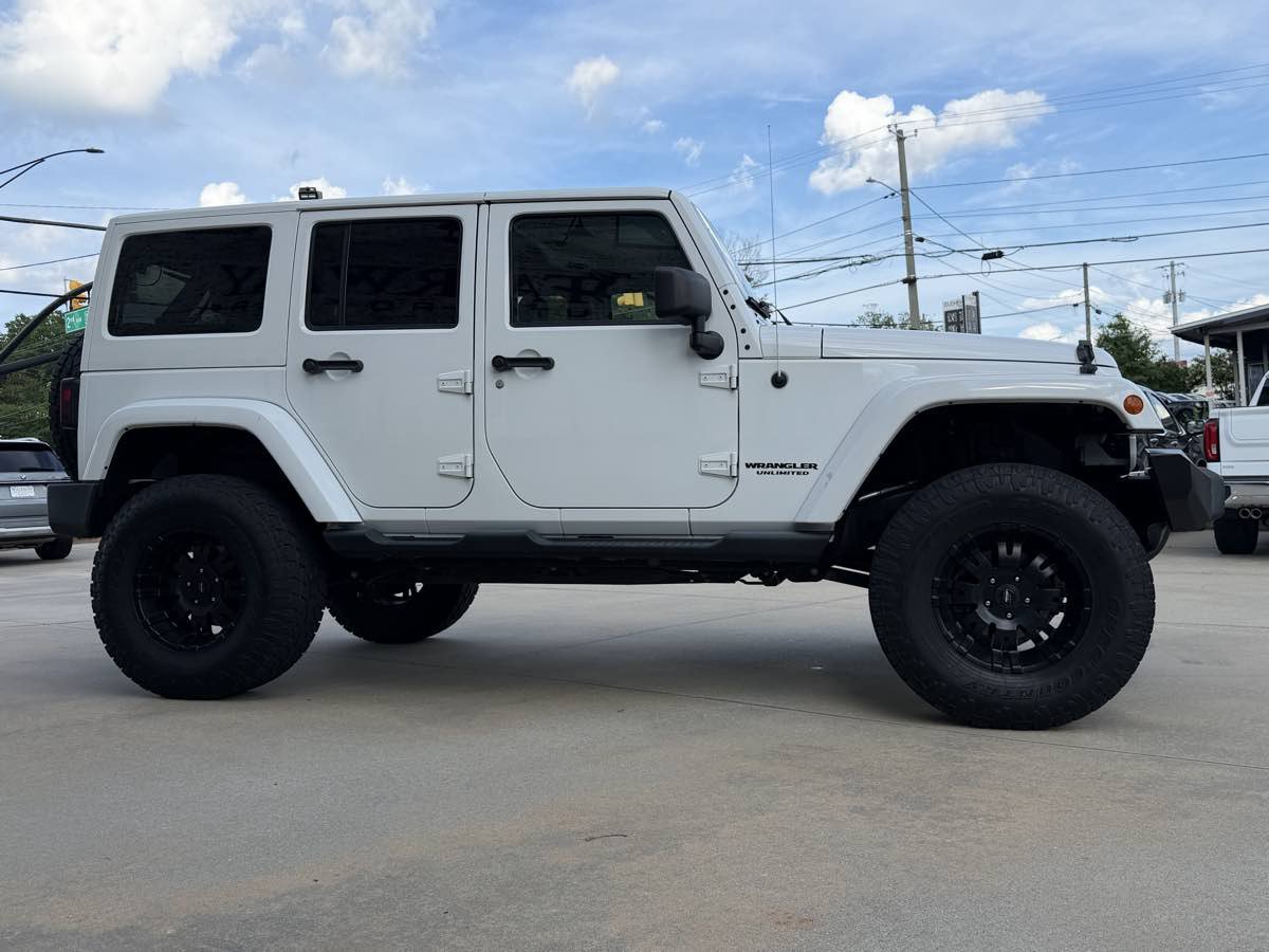 Used 2012 Jeep Wrangler Unlimited Sahara AWD/4WD image 6