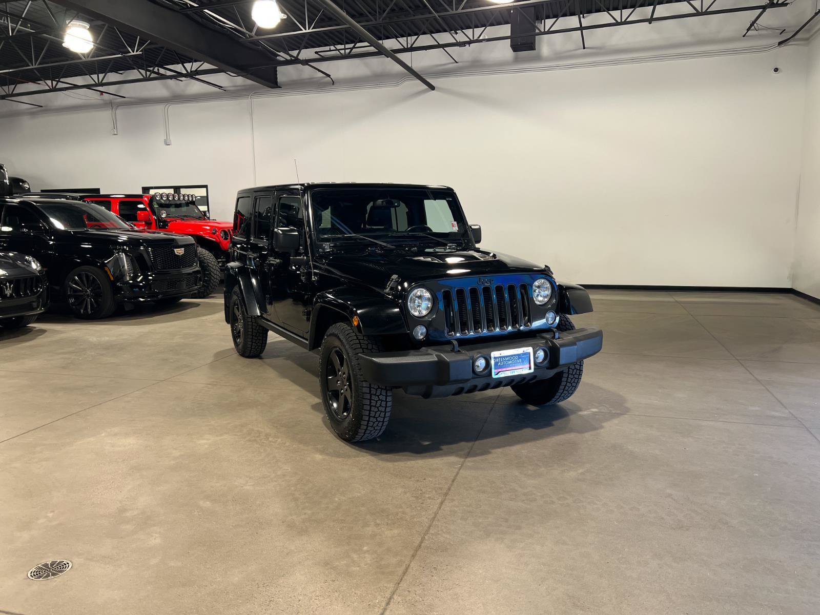 Used 2015 Jeep Wrangler Unlimited Sahara AWD/4WD image 1
