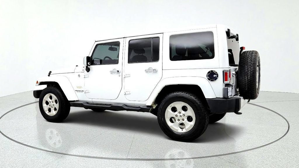 Used 2015 Jeep Wrangler Unlimited Sahara w/ Dual Top Group AWD/4WD image 7