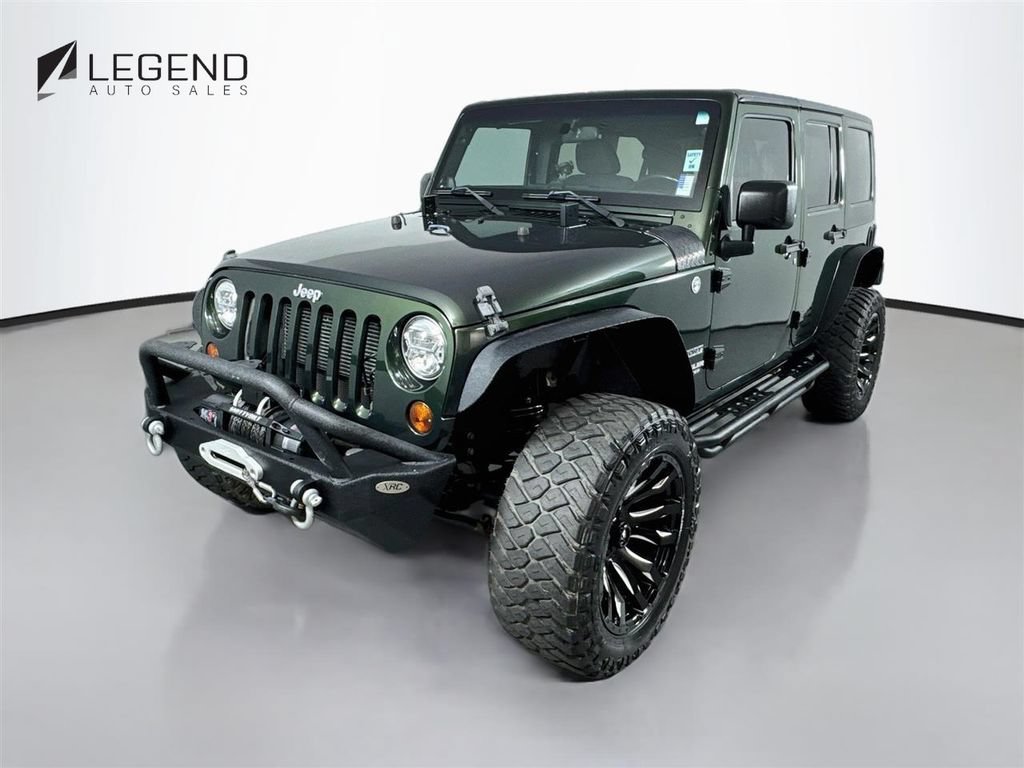 Used 2012 Jeep Wrangler Unlimited Sport w/ Connectivity Group AWD/4WD image 1