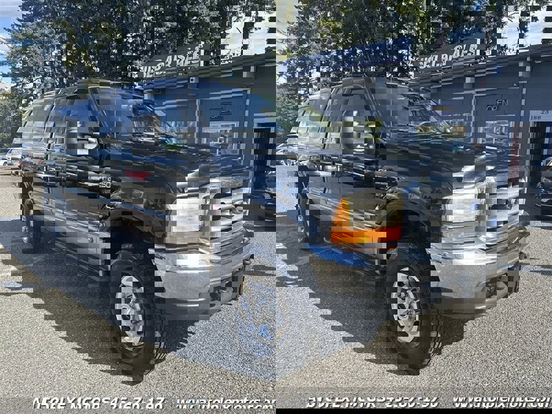 Used 1999 Ford F250 Lariat image 1