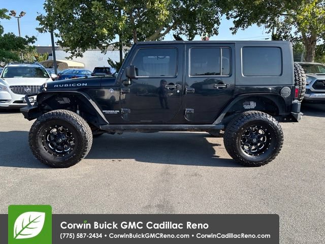 Used 2010 Jeep Wrangler Unlimited Rubicon w/ Dual Top Group AWD/4WD image 3