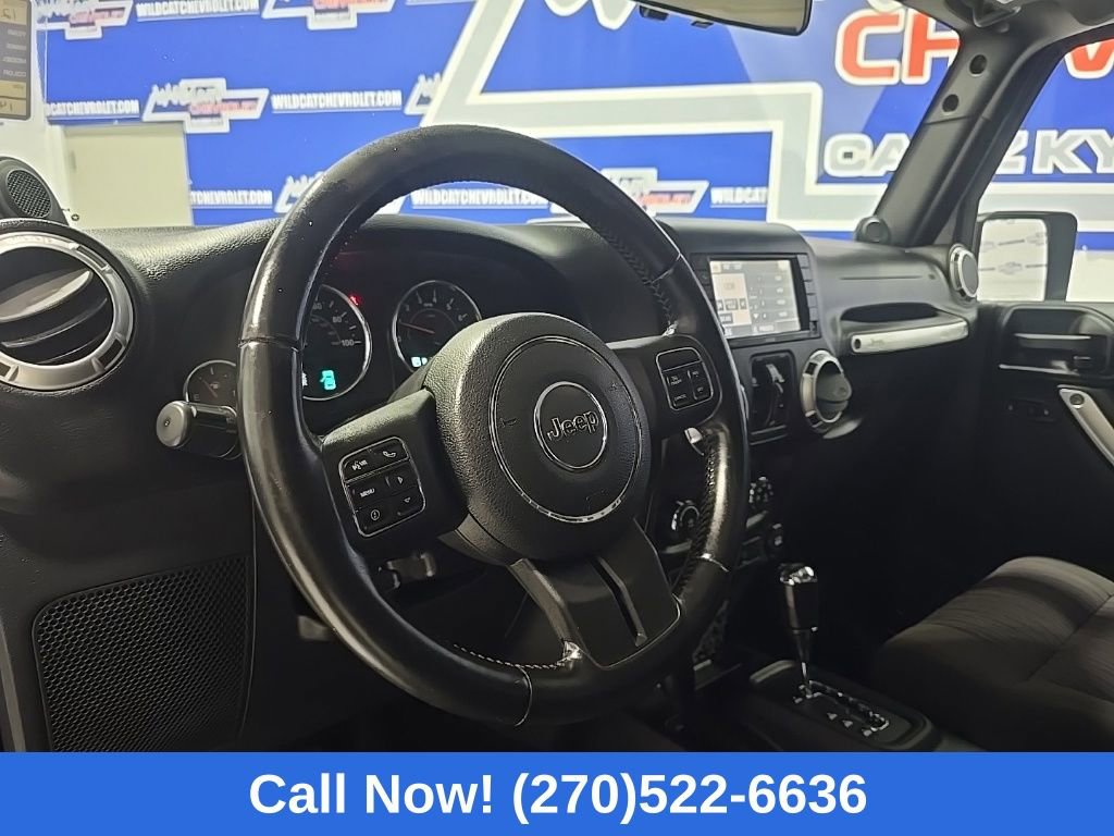 Used 2012 Jeep Wrangler Unlimited Sahara w/ Dual Top Group AWD/4WD image 16