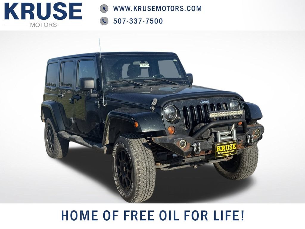 Used 2012 Jeep Wrangler Unlimited Sahara w/ Dual Top Group AWD/4WD image 1