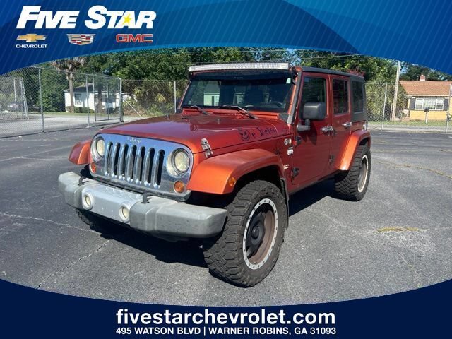 Used 2009 Jeep Wrangler Unlimited Sahara w/ Dual Top Group AWD/4WD image 1