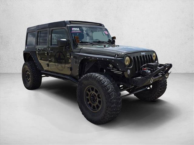 Used 2015 Jeep Wrangler Unlimited Rubicon w/ Connectivity Group AWD/4WD video 3
