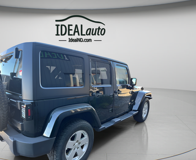 Used 2012 Jeep Wrangler Unlimited Sahara w/ Dual Top Group AWD/4WD image 2