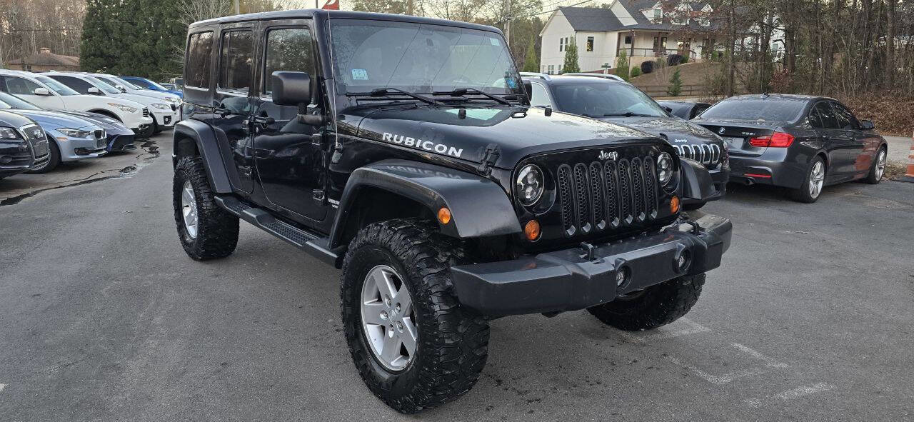 Used 2012 Jeep Wrangler Unlimited Rubicon w/ Dual Top Group AWD/4WD image 3