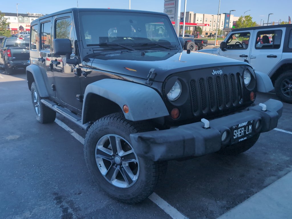Used 2011 Jeep Wrangler Unlimited Sport AWD/4WD image 2