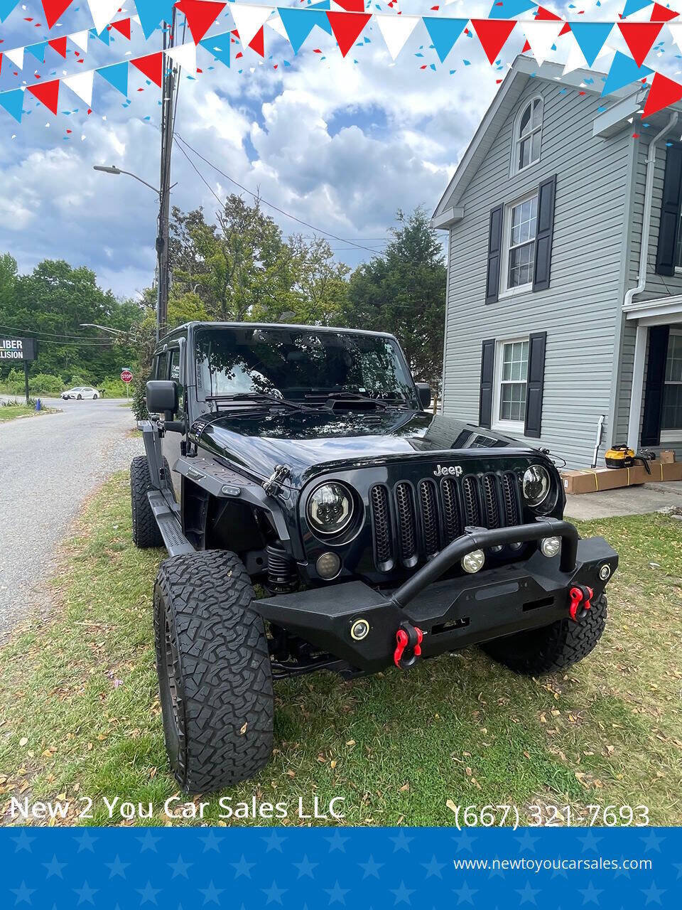 Used 2012 Jeep Wrangler Unlimited Sahara w/ Dual Top Group AWD/4WD image 1