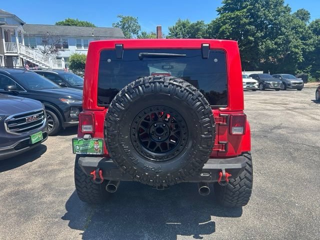 Used 2014 Jeep Wrangler Unlimited Sahara w/ Mopar Chrome Edition Group AWD/4WD image 9
