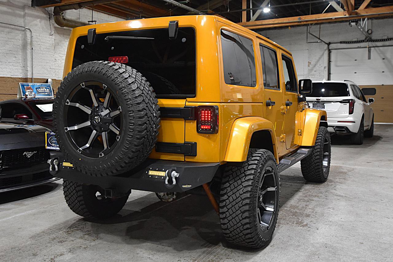 Used 2014 Jeep Wrangler Unlimited Sahara AWD/4WD image 9
