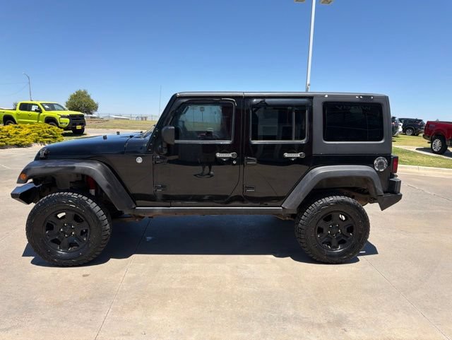 Used 2012 Jeep Wrangler Unlimited Rubicon w/ Dual Top Group AWD/4WD image 4