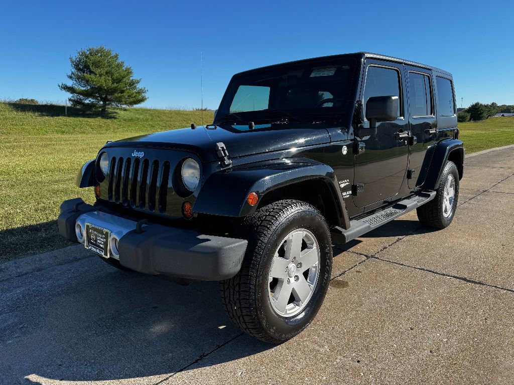 Used 2011 Jeep Wrangler Unlimited Sahara