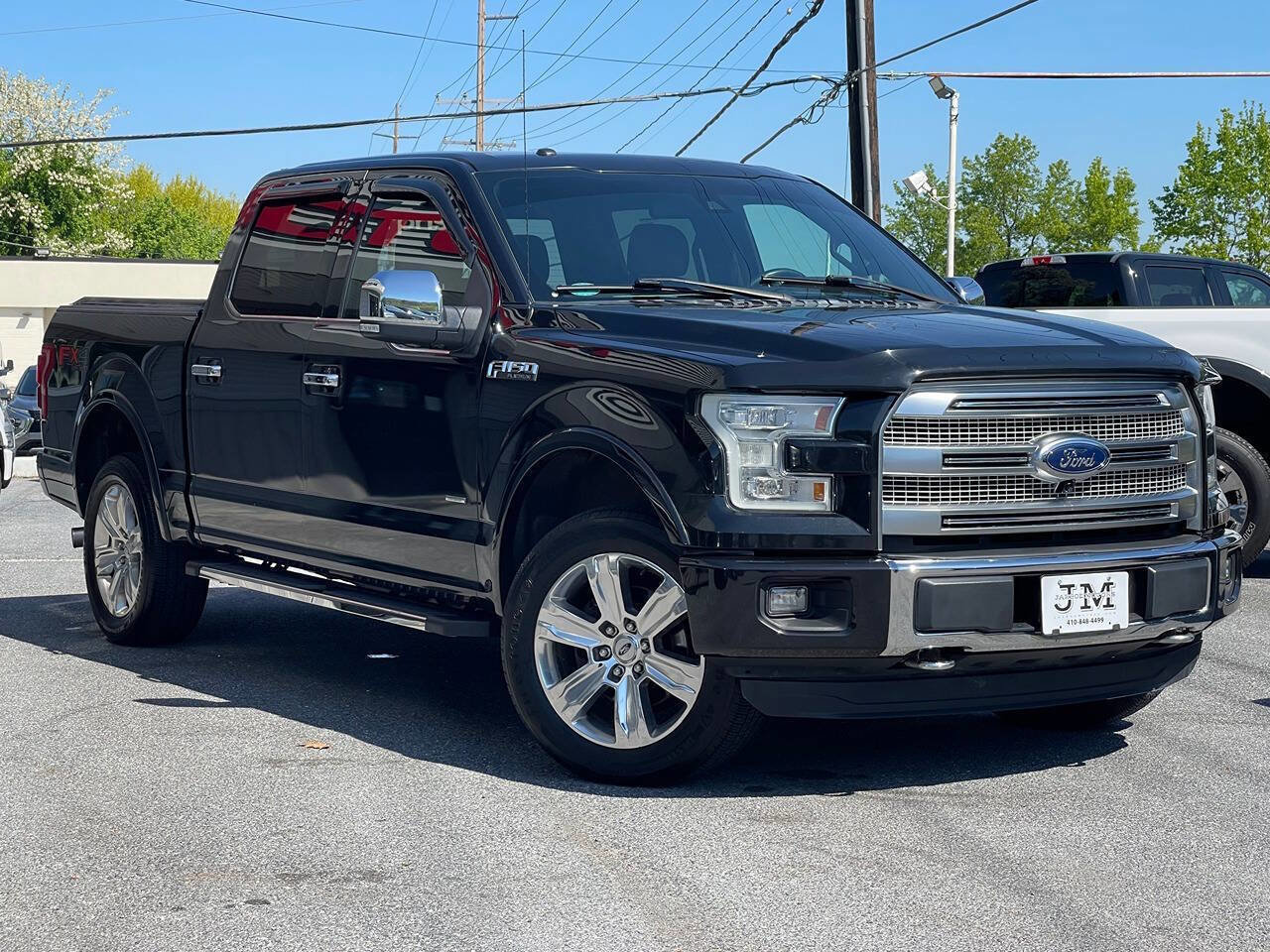 Used 2015 Ford F150 Platinum w/ Equipment Group 701A Luxury AWD/4WD image 1