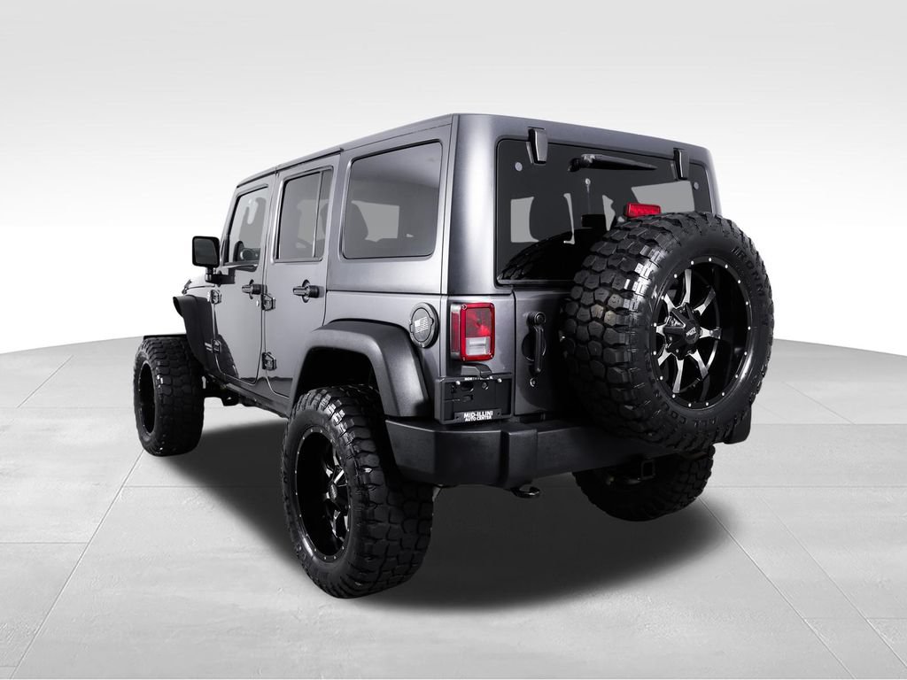 Used 2014 Jeep Wrangler Unlimited Rubicon w/ Dual Top Group AWD/4WD image 7