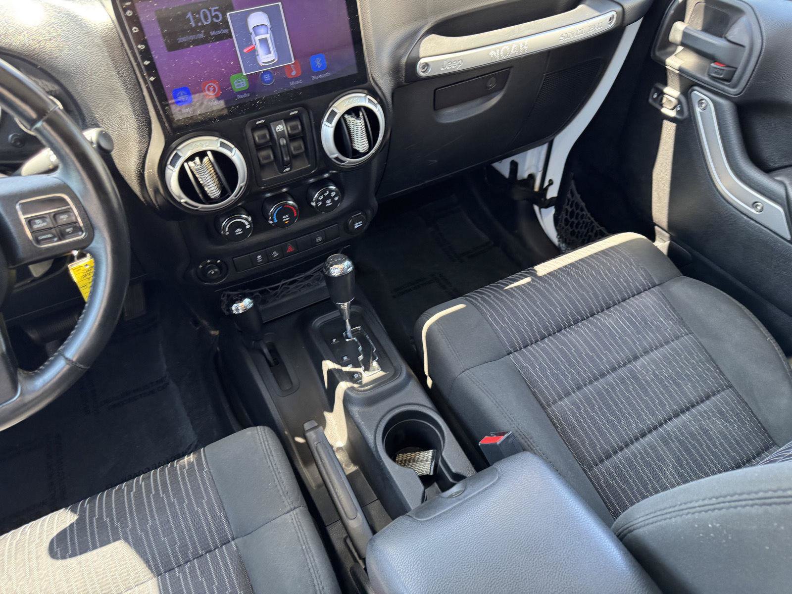 Used 2012 Jeep Wrangler Unlimited Sahara w/ Dual Top Group AWD/4WD image 28