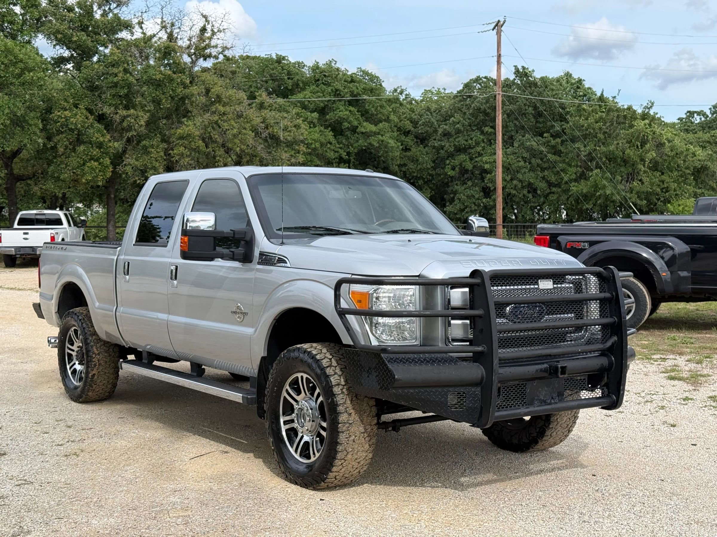 Used 2014 Ford F250 Platinum w/ FX4 Off-Road Package AWD/4WD image 1